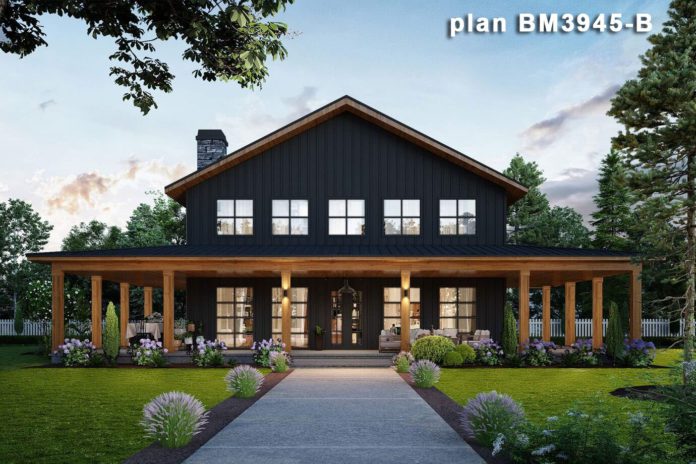 black barndominium with wraparound porch