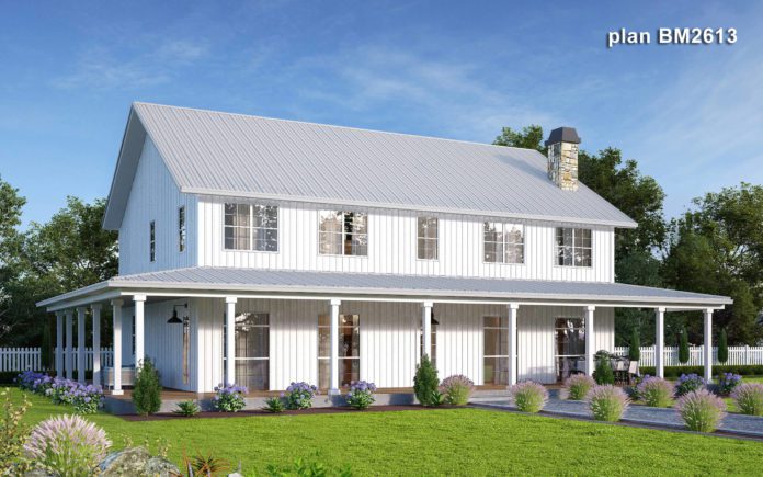 white farmhouse barndominium with wraparound porch