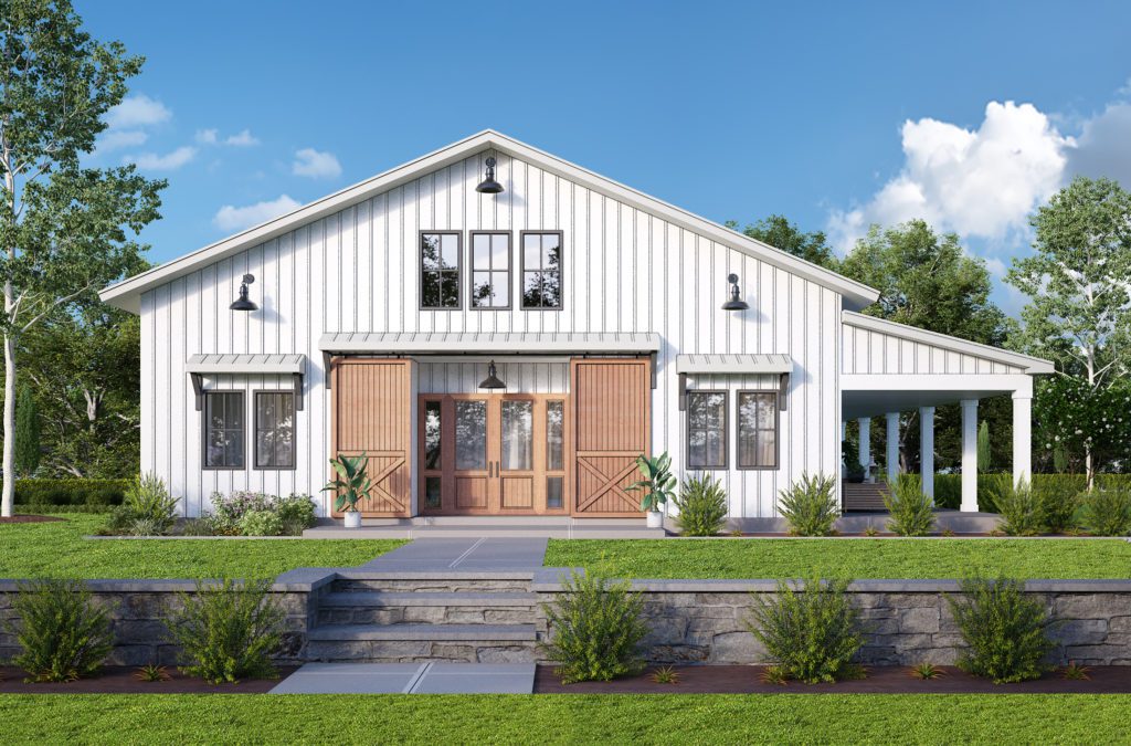 white barndominium with porch and large barn doors leading to the entryway