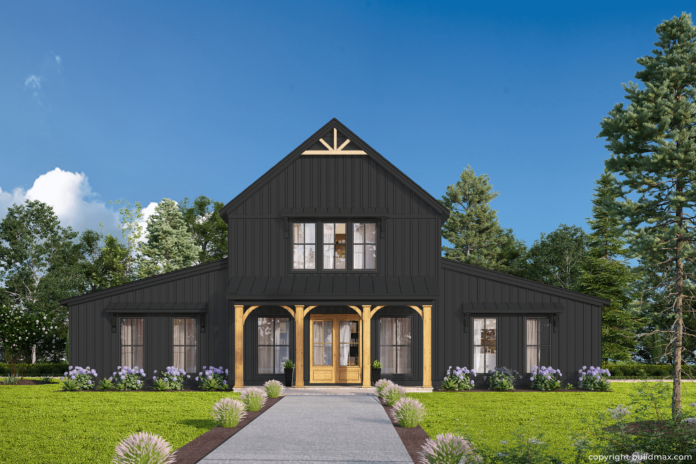 black barndominium with covered front porch