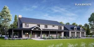 grey barndominium with wraparound porch and 3 car garage