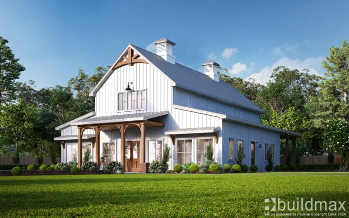 white barndominium with cupolas