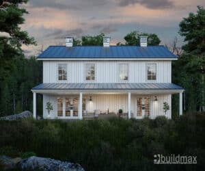 white barndominium with cupolas by a lake