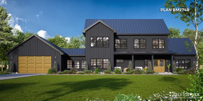 black barndominium with garage